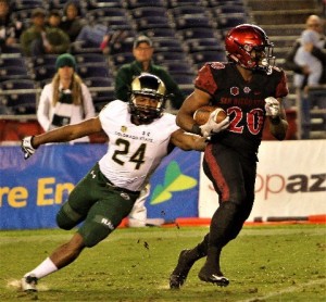 Ex-Norwalk High star Rashaad Penny gets away from Bryce Peters on one of his career-high seven kickoff returns in San Diego State University's home finale against Colorado State University on Nov. 26. Penny had 113 return yards against the Rams, which is a season-high and second most in his three years at SDSU. PHOTO BY ARMANDO VARGAS, Contributing Photographer