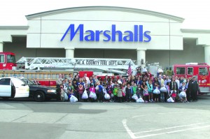 La Mirada students and volunteers stand outside Marshalls after members of the Rotary Club sponsored a shopping spree for local children in need. This year, 46 La Mirada children took part in the shopping spree and each child had a budget of $110 to spend at Marshall’s on new clothing, jackets and shoes.