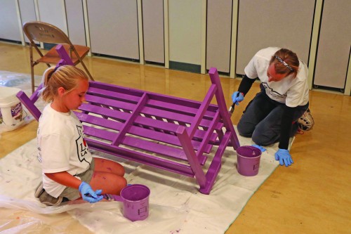 Love La Mirada participants paint benches at Dulles Elementary School in La Mirada.