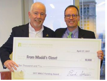  FIGHTING CHILDREN’S CANCER -- From Maddi’s Closet was one of several non-profit organizations around the nation receiving funding from the Expect Miracles Foundation to support its fight against children’s cancer.  Expect Miracles Foundation Board Member Jim Keenan (l) and Executive Director Frank Heavey presented the $10,000 check during recent ceremonies in Boston.